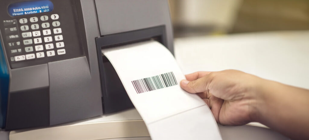 Action shot of a thermal transfer printer printing labels.